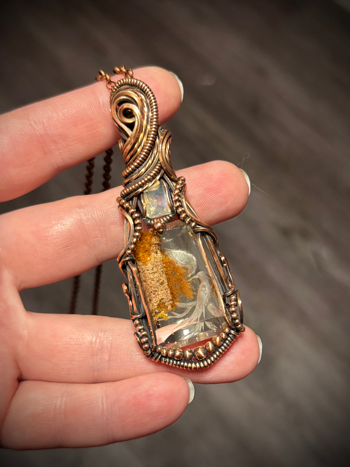 .Bird pendant